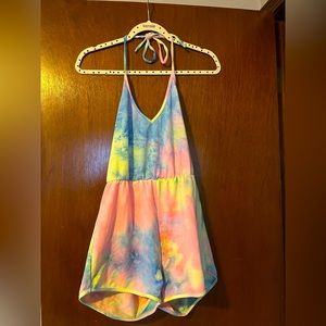 Womens shorts romper tie dye with tie around neck.